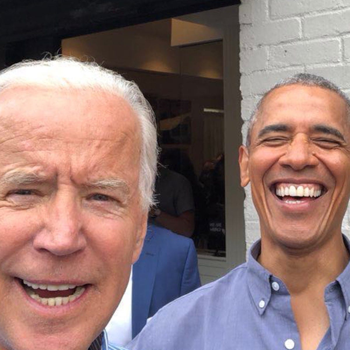 Uncle Joe and Barack laughing in the daddies selfie.