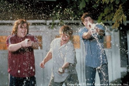 J.D. (Jack Black), Wayne (Steve Zahn) and Darren (Jason Biggs) celebrate a touchdown with a beer shower in Columbia's Saving Silverman - 2001