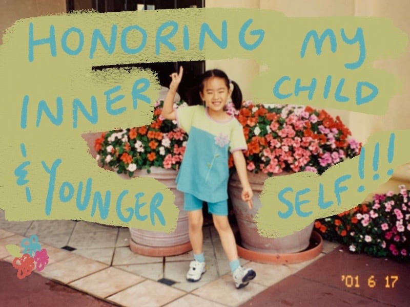 Cheerful 6 year old Asian girl posing with flowers and big words saying Honoring the Inner child and younger self!