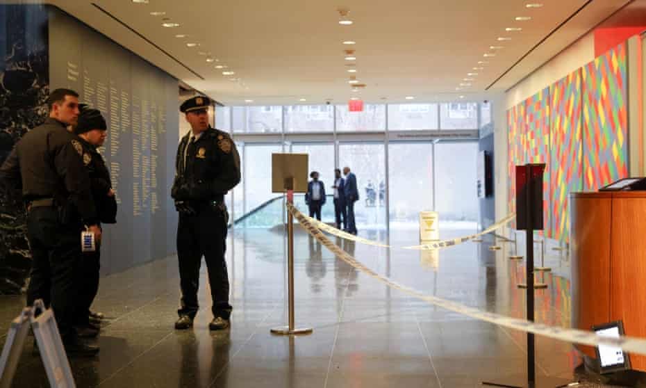 New York City Police Department gather in the lobby of the Museum of Modern Art after an alleged multiple stabbing incident, in New York, on Saturday.