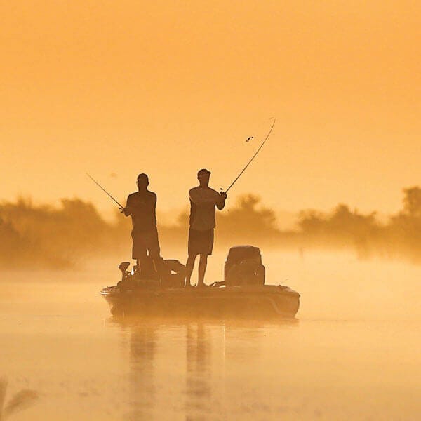 Two men fishing in boat