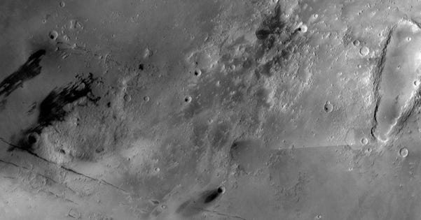 Cerberus Fossae and Zunil crater