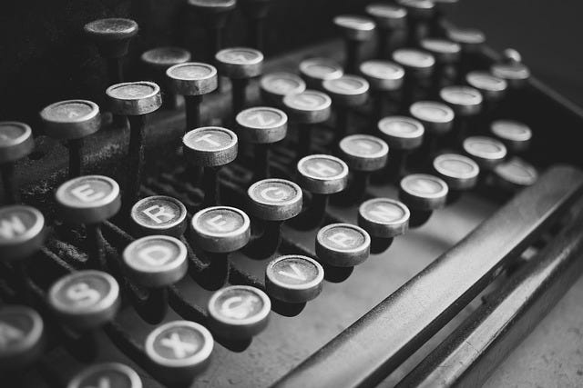 Dusty dirty typewriter keys. Image by freestocks-photos from Pixabay.