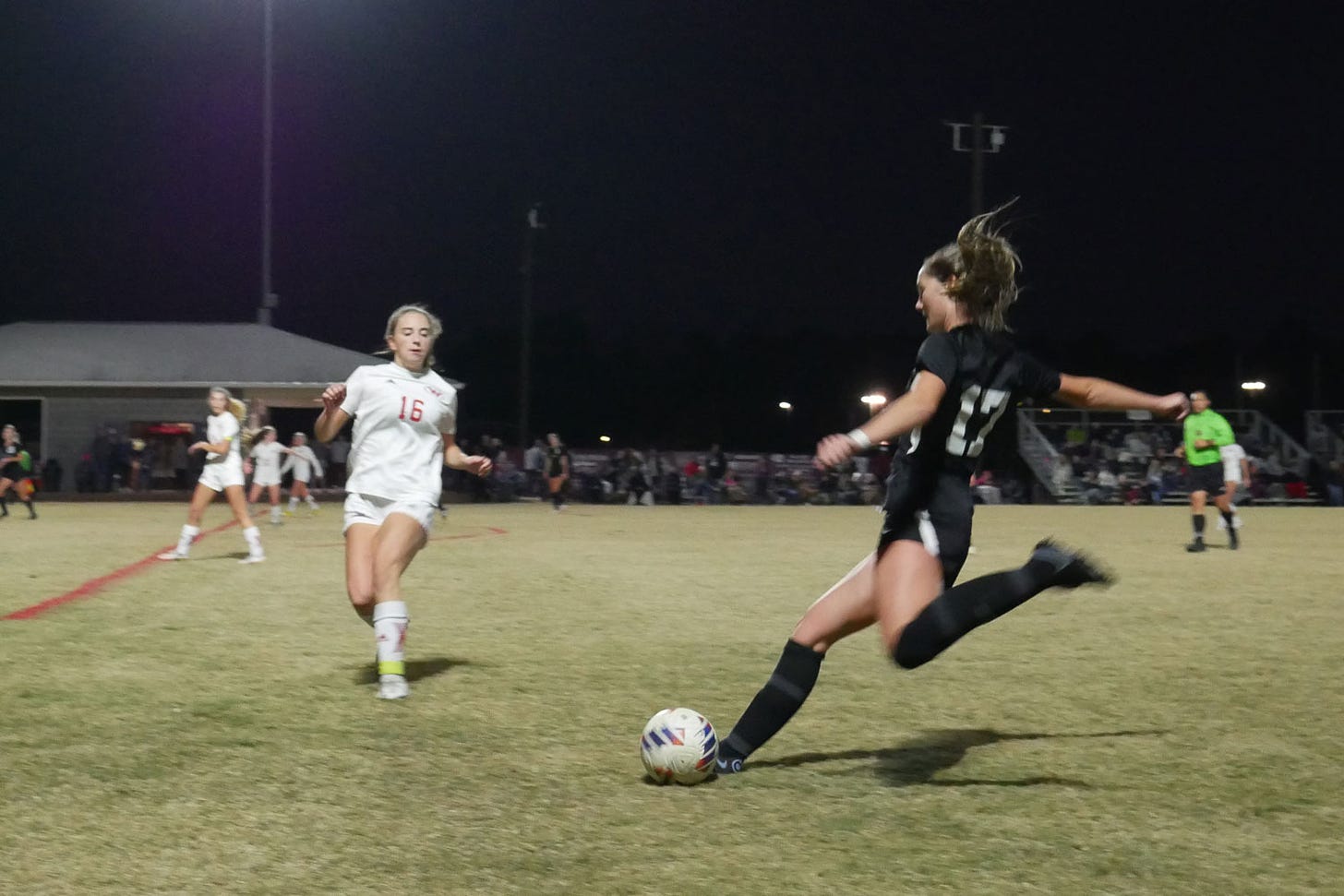 Bearden and West girls soccer playings competing.
