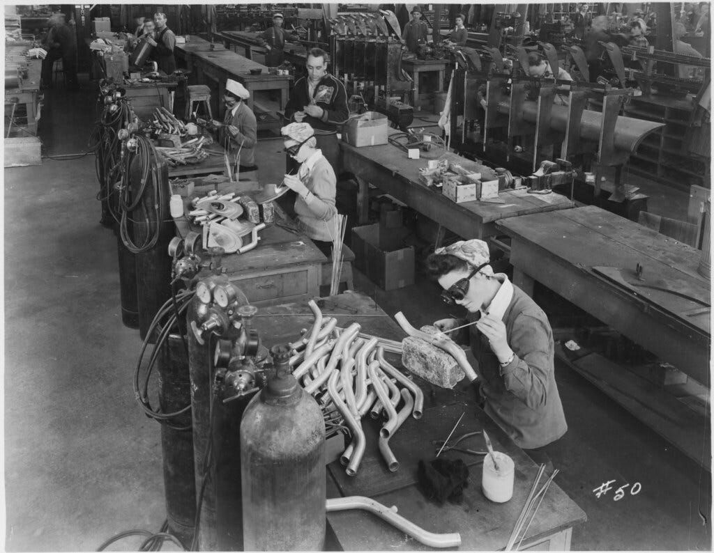 Women working in the welding room, welding and riveting, at the Canadian Car and Foundry Co.