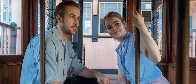 Shot of Ryan Gosling and Emma Stone on a streetcar in La La Land