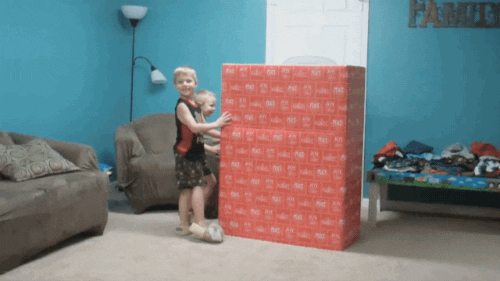 gif of a present chasing terrified children
