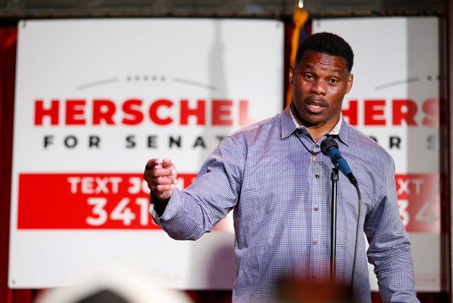 Republican U.S. Senate candidate Herschel Walker speaks at a rally in Athens, Ga., in May 2022.