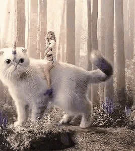 Taylor Swift looking magnificent, spreading fairy dust while riding a white striped cat who is also a unicorn. Caticorn. This image is pure magic.