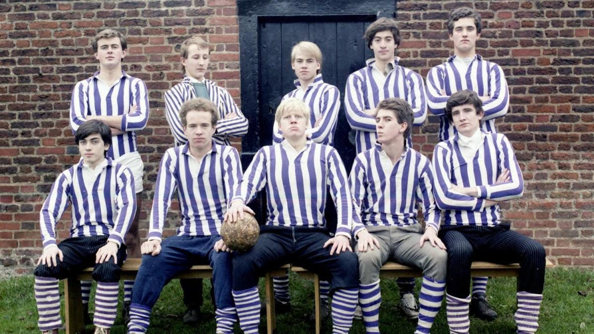 Playing the game: Johnson (front row, centre) prepares to lead his team at the Eton Wall Game, 1982