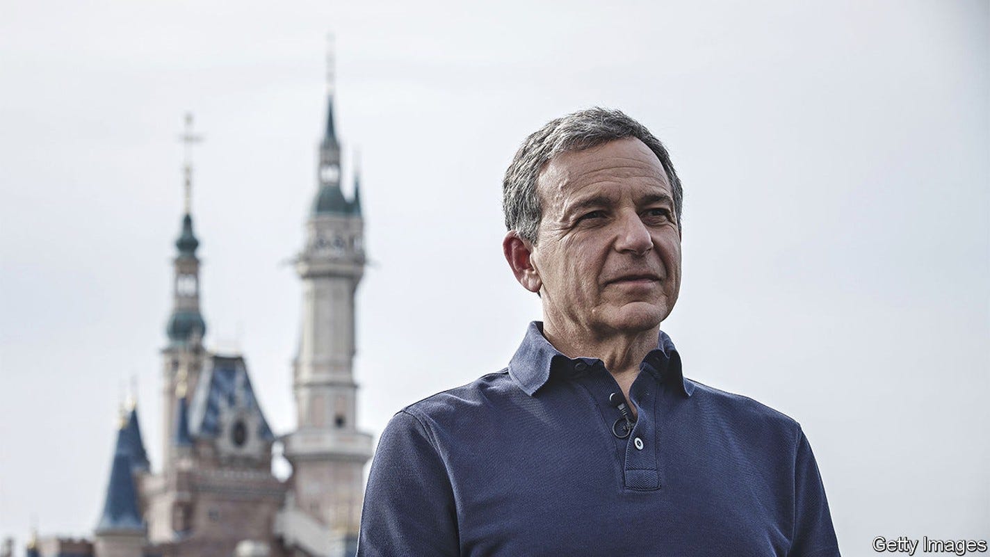 Bob Iger, chief executive officer of Walt Disney Co., listens during a Bloomberg Television interview at Disneyland in Shanghai, China, on Friday, June 16, 2017. Iger said he stepped down from Donald Trump's jobs panel two weeks ago following the president's decision to exit the Paris Accord on climate change because businesses must accept responsibility to protect the environment. Photographer: Qilai Shen/Bloomberg via Getty Images