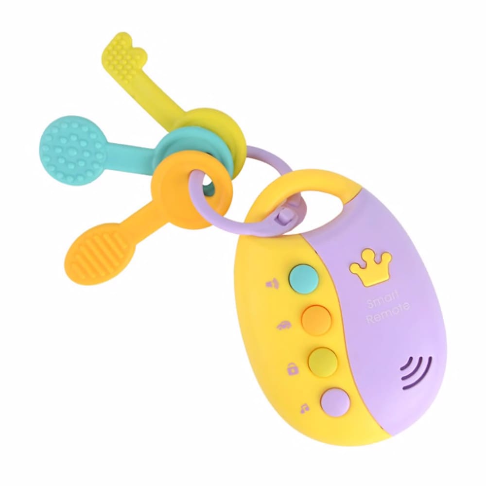foto com um brinquedo de bebê com pedaços de borracha em forma de chaves coloridas, presas a um pedaço de plástico colorido imitando um controle de alarme de carro