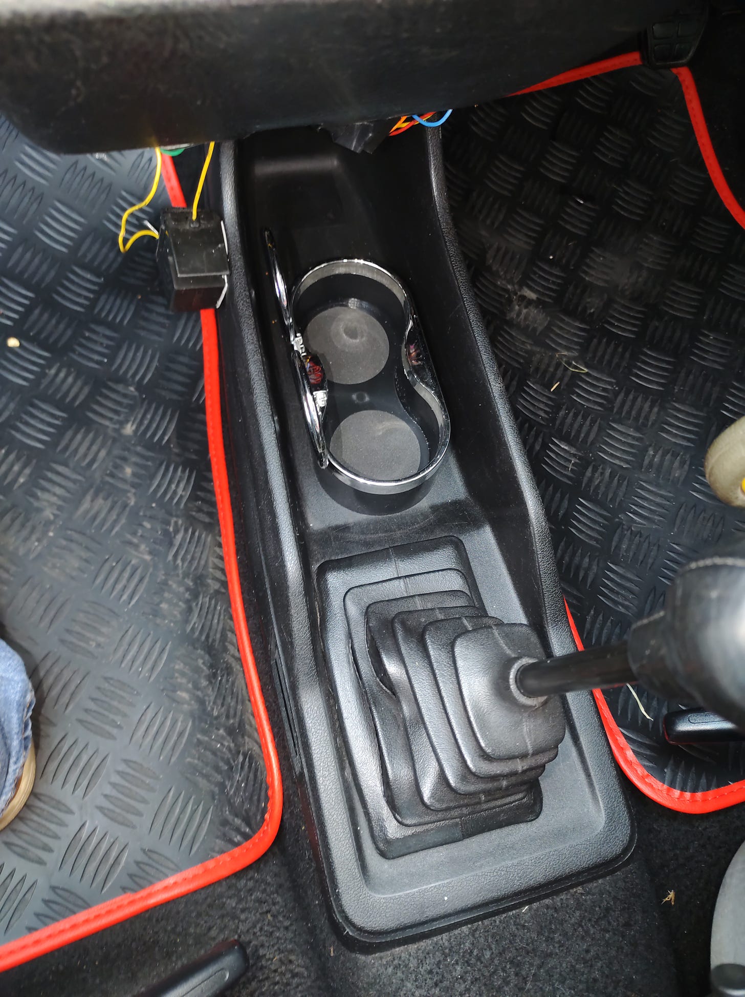 Cheap eBay cupholder installed in recess between gearstick and dashboard