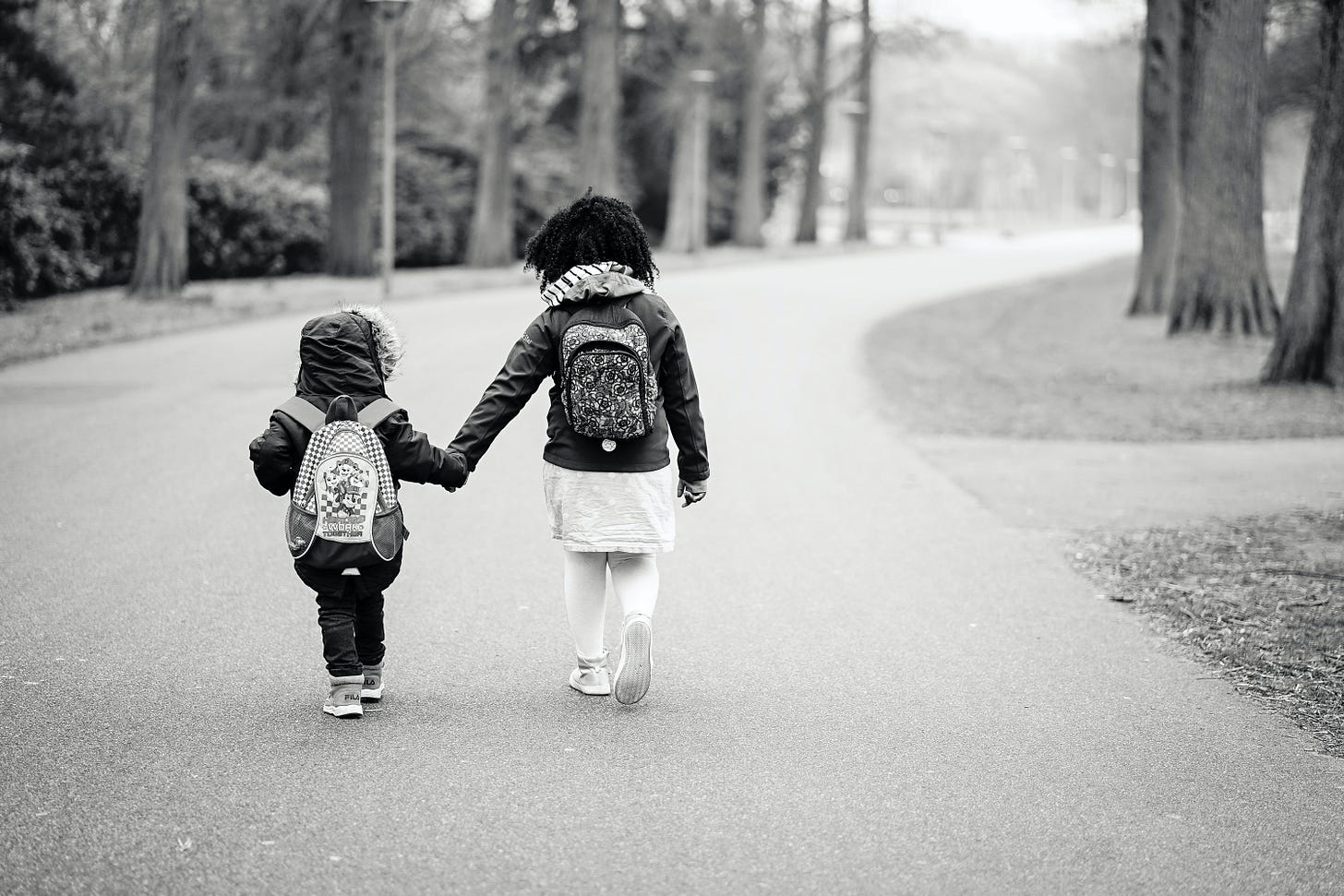 Children walking. Photo by Guy Basabose on Unsplash Children walking. Photo by Guy Basabose on Unsplash