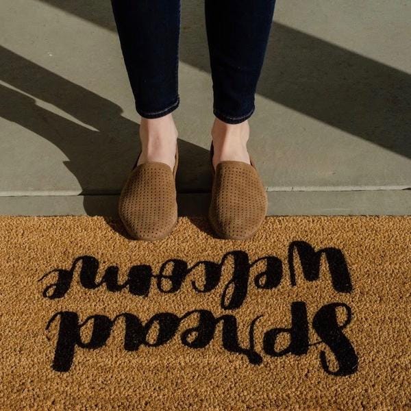Spread Welcome Mat