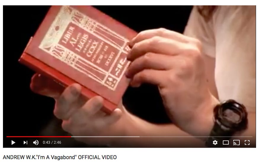 Andrew WK reading The Book of the Law in the I'm A Vagabond video