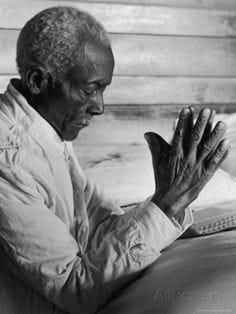 African American Sharecropper Dave Alexander Saying Evening Prayers as He Kneels at Bedside at Home Photographic Print by Alfred Eisenstaedt at AllPosters.com