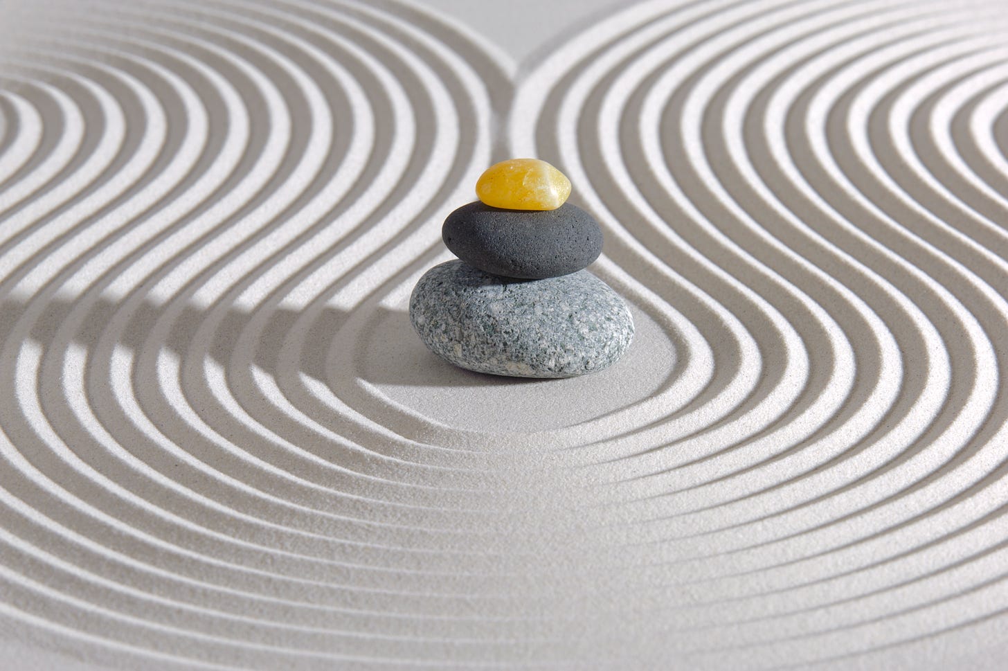 Zen meditation garden rocks in sand