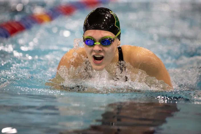 Northern Iowa swimmer Lily Ernst, shown here in 2019 while competing in high school for Iowa City West, died Wednesday.
