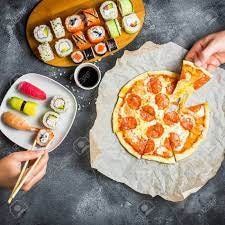 Pizza And Sushi Rolls And Hands Take Food. Food Background. Flat Lay, Top  View. Stock Photo, Picture And Royalty Free Image. Image 87008614.
