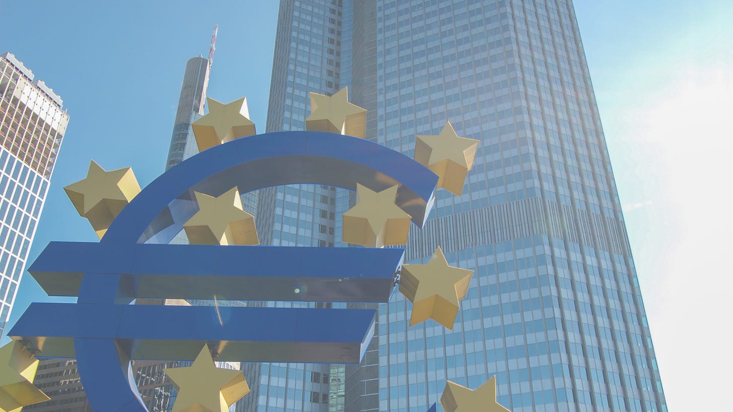 big euro emblem in front of a modern building