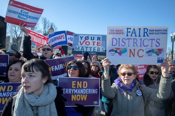 Protesters at a “Fair Maps” rally in Washington in 2019.