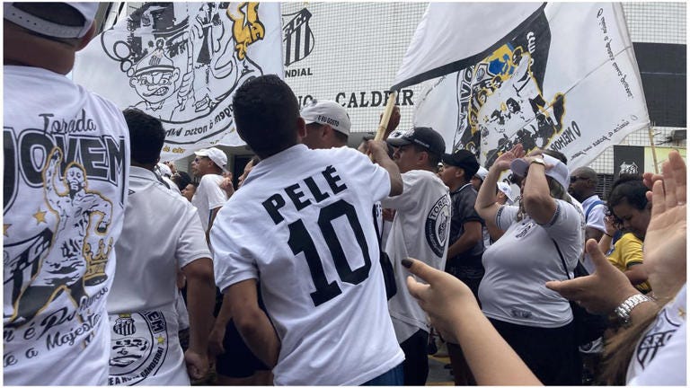 Members of supporters' club Torcida Jovem were among those who turned up to say goodbye to Pele