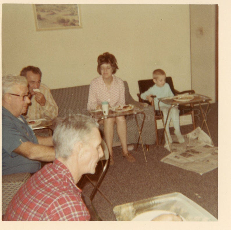 Family Eating Dinner on TV Trays google it While Watching image 0