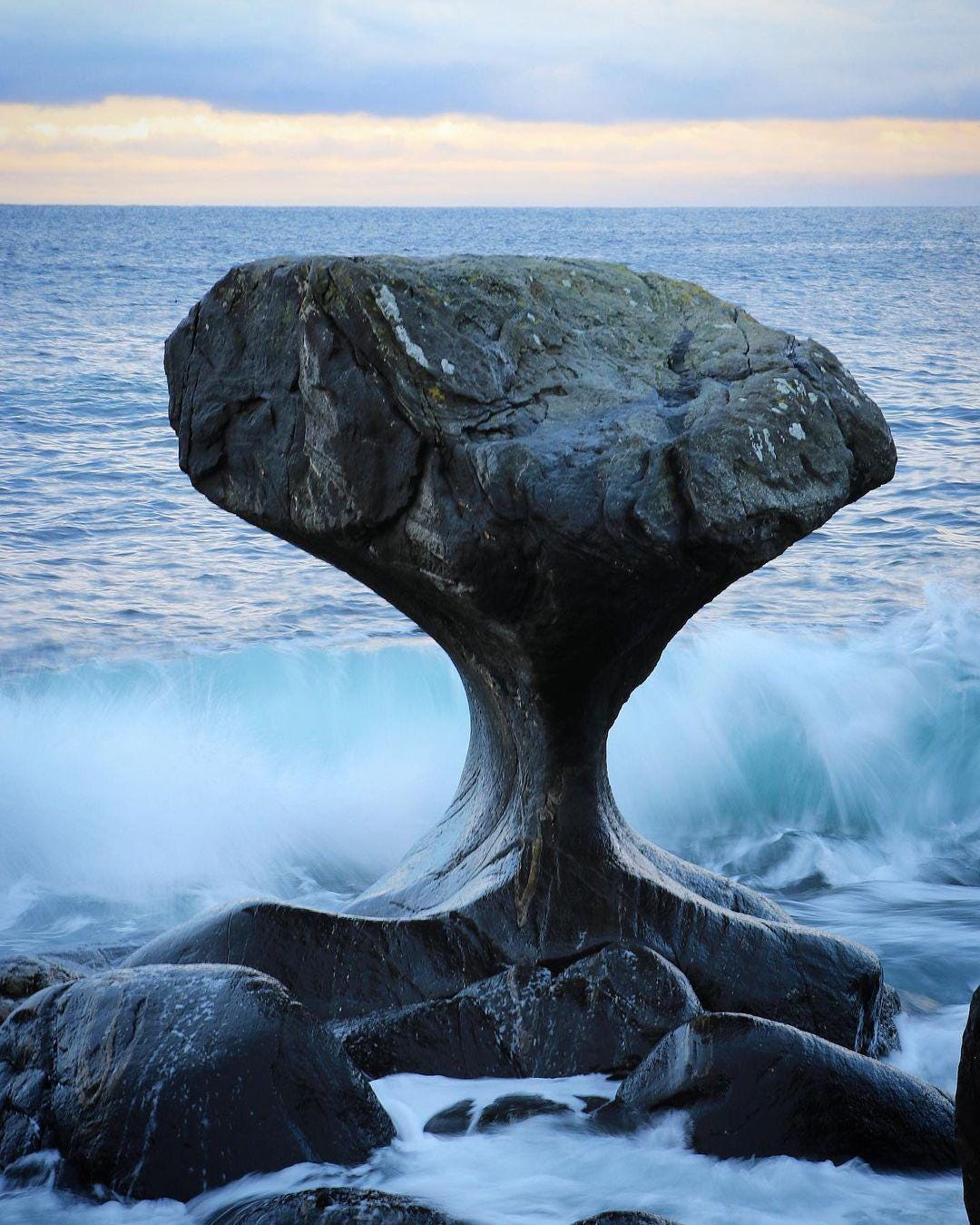 This rock in Norway has been shaped over thousands of years by the crashing  waves : r/interestingasfuck