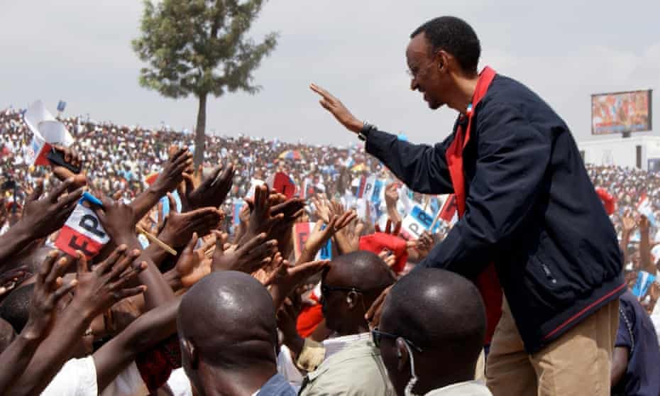 President Kagame shakes hands with members of the crowd at a rally in Gicumbi, northern Rwanda, in August 2010.