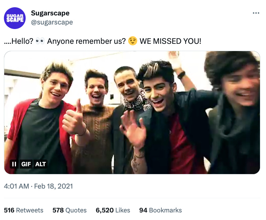 Tweet from Sugarscape that says "Hello? Anyone remember us? WE MISSED YOU" with a photo of One Direction