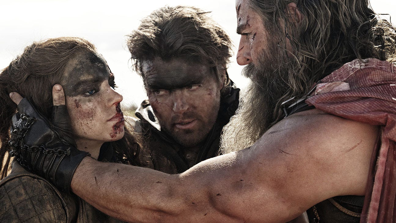 Anya Taylor-Joy as Furiosa, Tom Burke as Praetorian Jack and Chris Hemsworth as Dementus in FURIOSA A MAD MAX SAGA