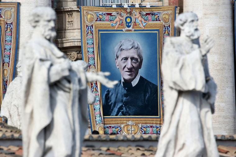 Tapestry featuring the portrait of the new Saint Cardinal John Henry Newman  is draped from the balcony overlooking St. Peter's Square during a canonization ceremony held by Pope Francis on October 13, 2019 in Vatican City, Vatican. 