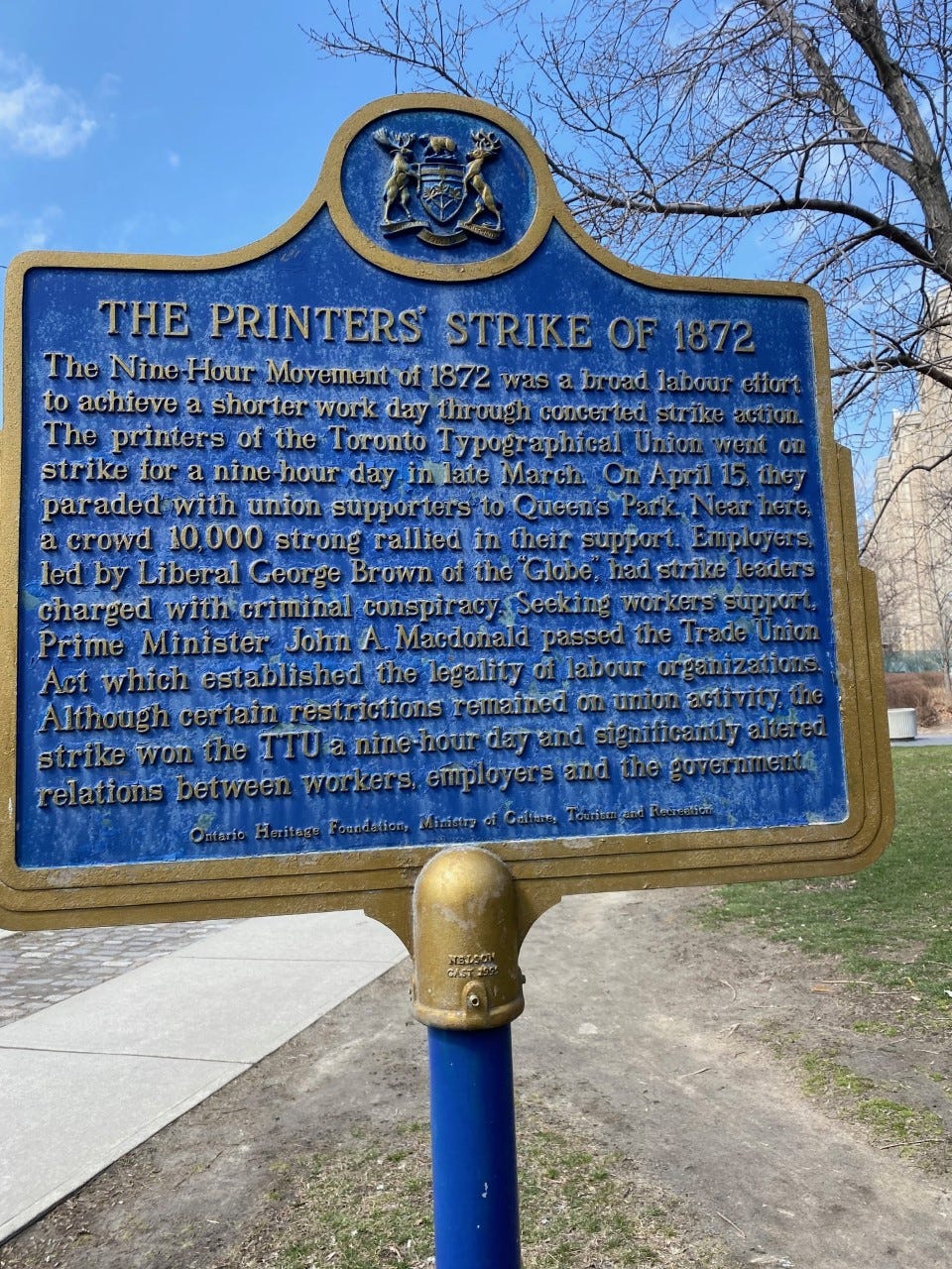 blue plaque dedicated to the printer's strike