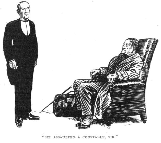 Jeeves standing before Bertie, sitting in an armchair. Jeeves’s expression is stern. Bertie looks shocked. The caption reads, ""He assaulted a constable, sir.""