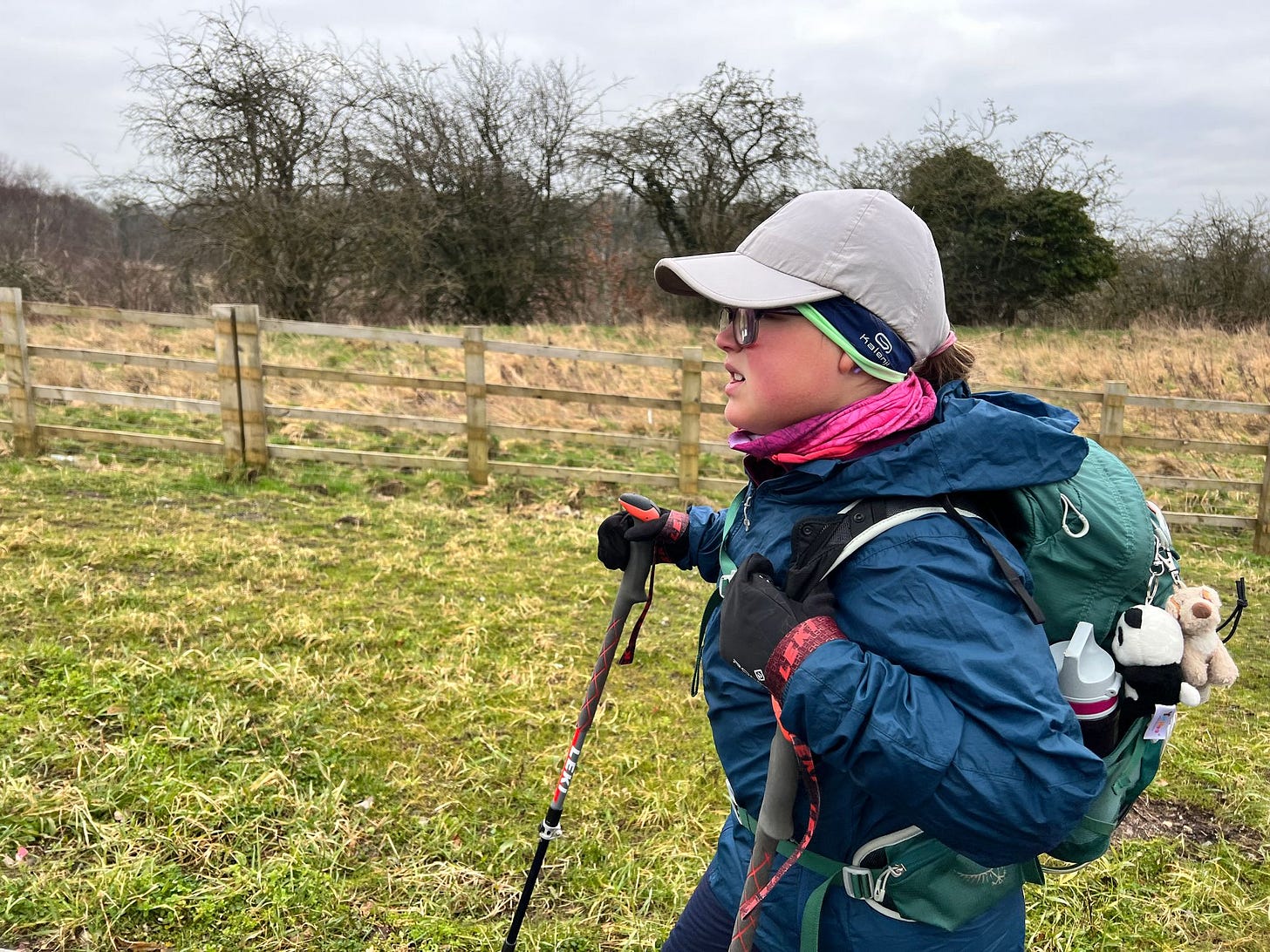 A rare sight, Eve with gloves, buff and ear warmers on! It was cold this morning