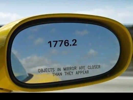 May be an image of rearview mirror, car, road and text that says '1776.2 OBJECTS IN MIRROR ARE CLOSER THAN THEY APPEAR'