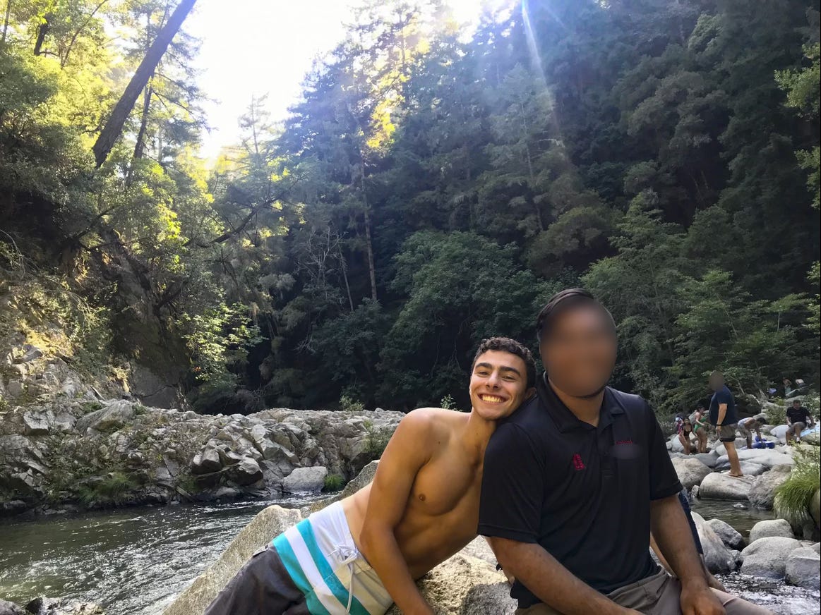 Luigi Mangione with a friend at the popular Garden of Eden swimming hole outside Santa Cruz.