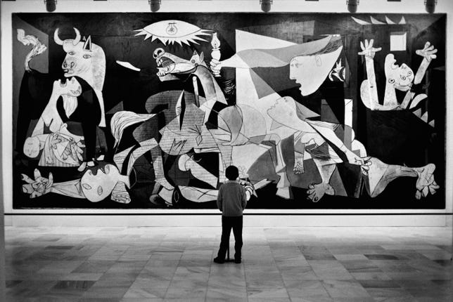 A black and white mural-sized painting depicting the tragedies of war and the suffering it inflicts upon individuals, particularly innocent civilians.