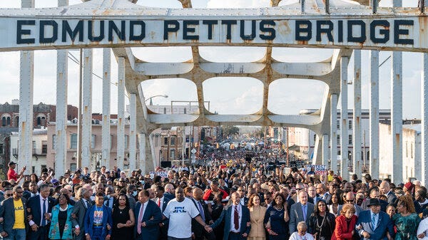 Vice President Harris (center) marches across the Edmund Pettus Bridge on March 6, 2022, in Selma, Ala., to commemorate the 57th anniversary of Bloody Sunday.
