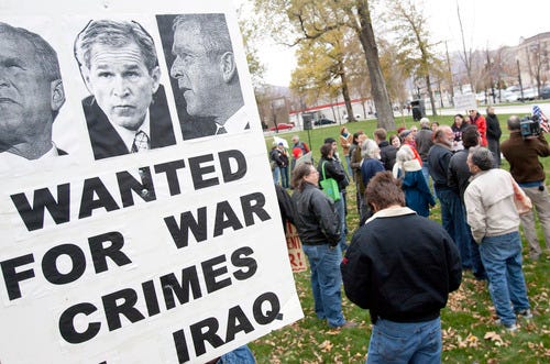 Bush branded a 'war criminal' at Rocky's Salt Lake rally - The Salt Lake  Tribune