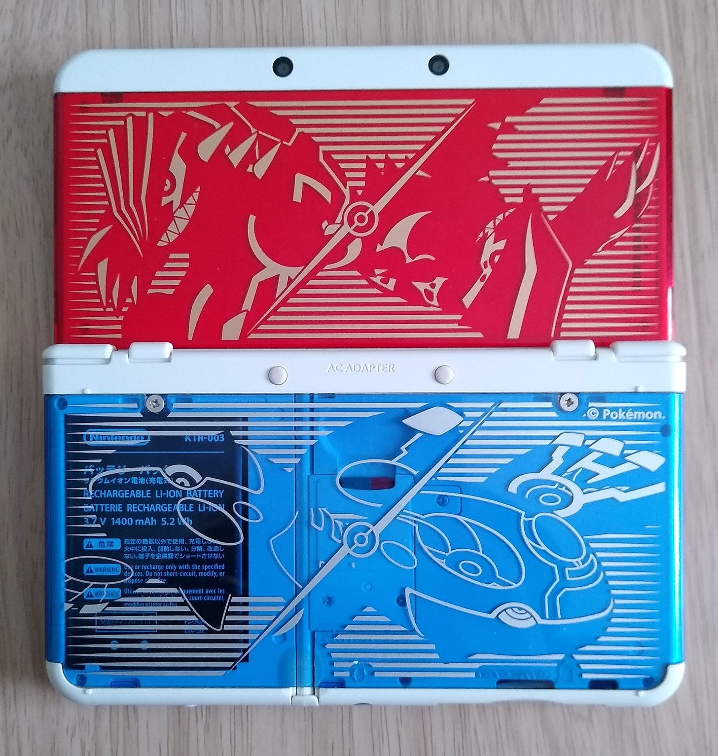 This New 3DS Cover Plate features Primal Groudon and Primal Kyogre