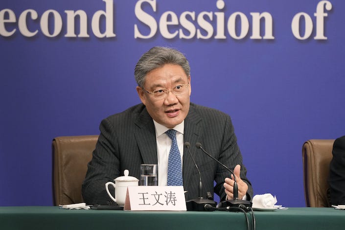 Wang Wentao, China’s Commerce Minister attends a news conference on the sidelines of the National People’s Congress in Beijing on March 6, 2024. Photo: Bloomberg