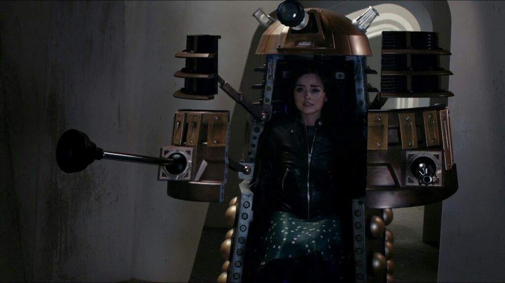 Clara pictured inside a Dalek, the Dalek is opened revealing a distressed Clara inside. Dr who