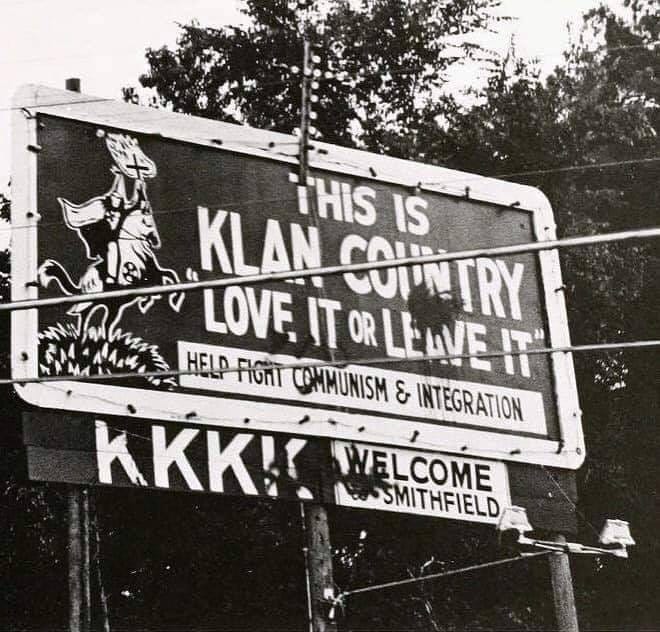 KKK Billboard from the 1970s saying, “This is Klan country. Love it or leave it.”