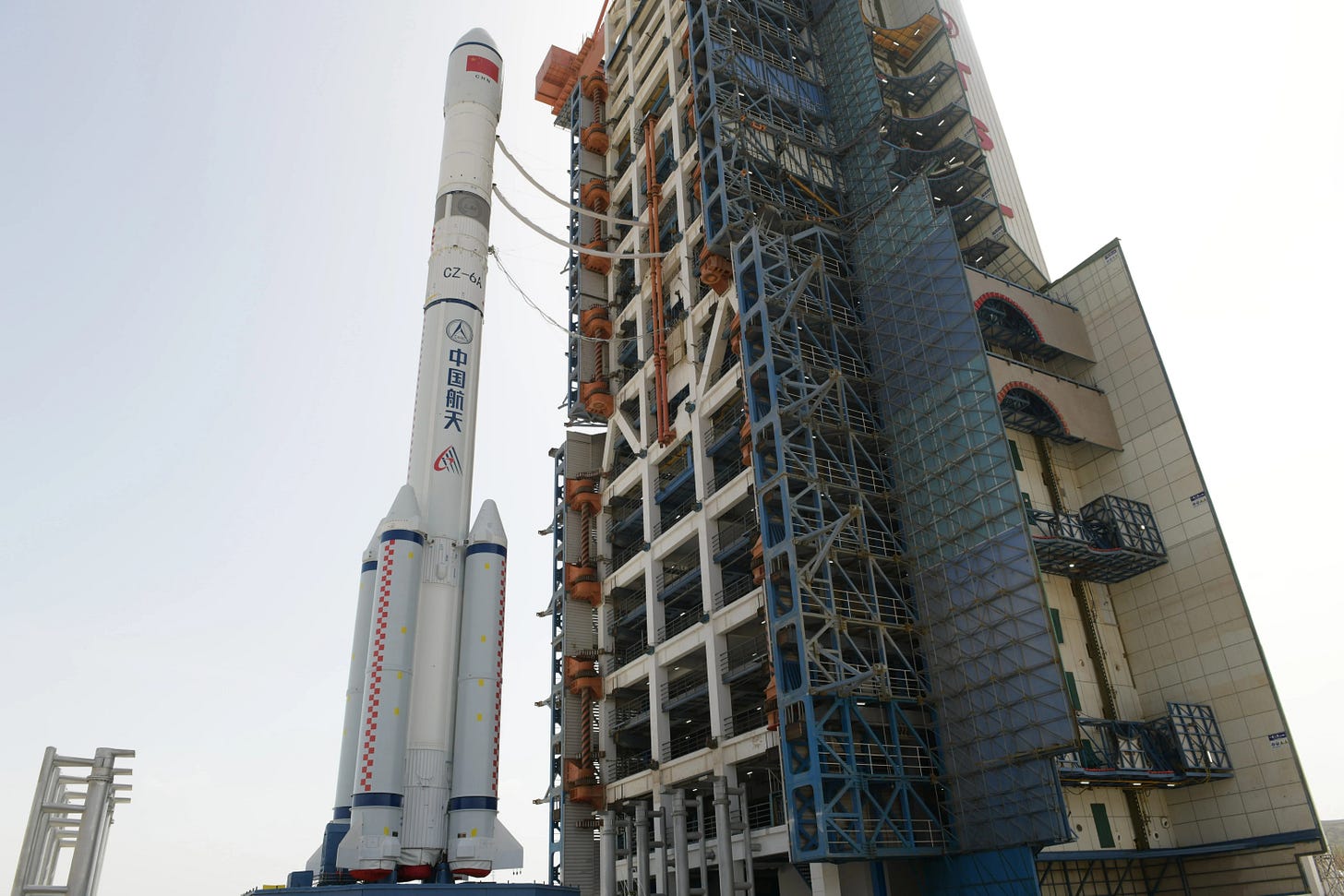 The Long March 6A Y9 vehicle on the launch pad, the fairing extension is from the grey band to the base of the regular fairing. The Long March 6A Y9 vehicle on the launch pad, the fairing extension is from the grey band to the base of the regular fairing.