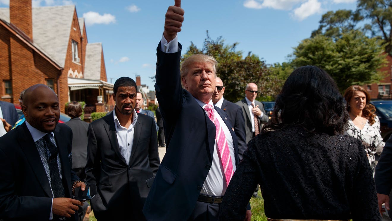 Trump to parishioners at black Detroit church: 'I'm here to listen'