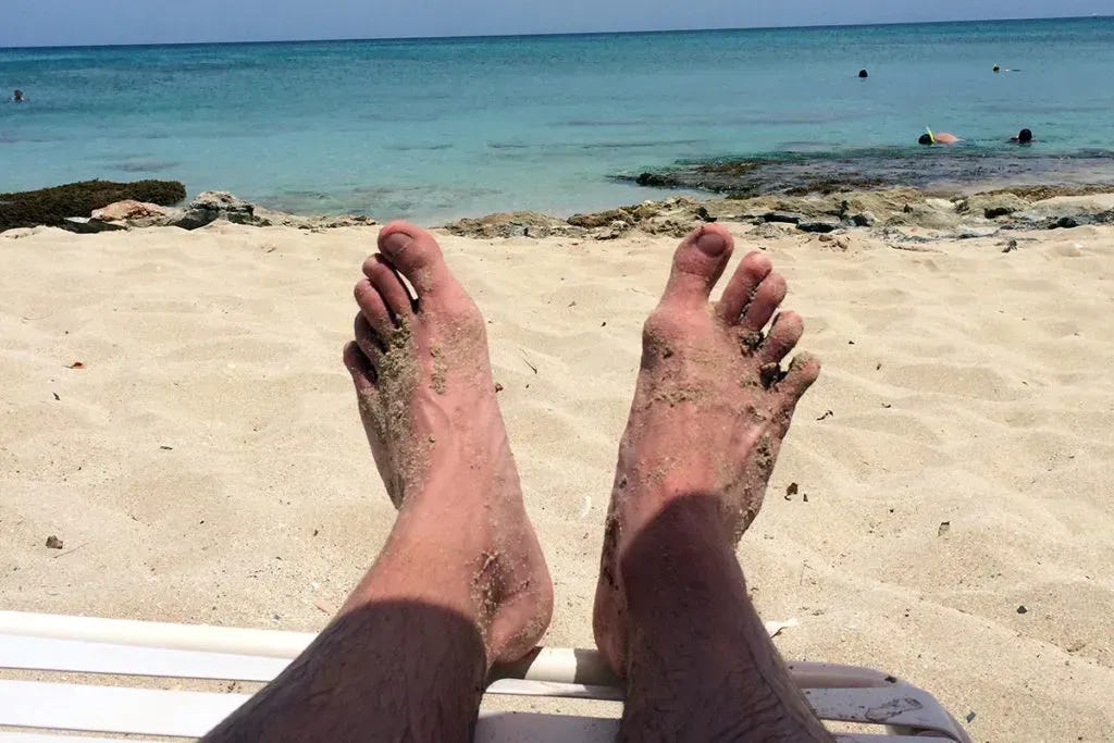 Sandy feet at the beach