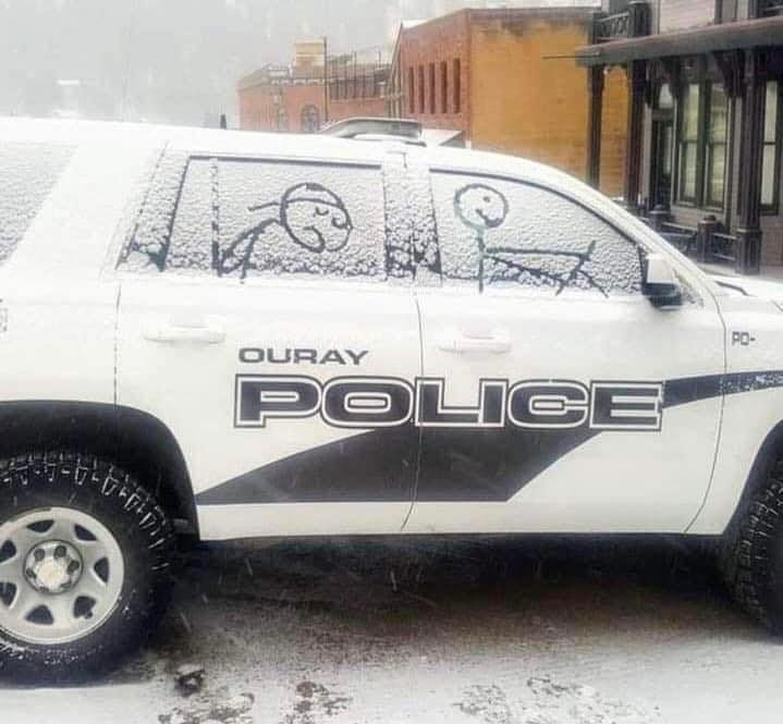 May be an image of car, road and text that says 'OURAY POLICE'