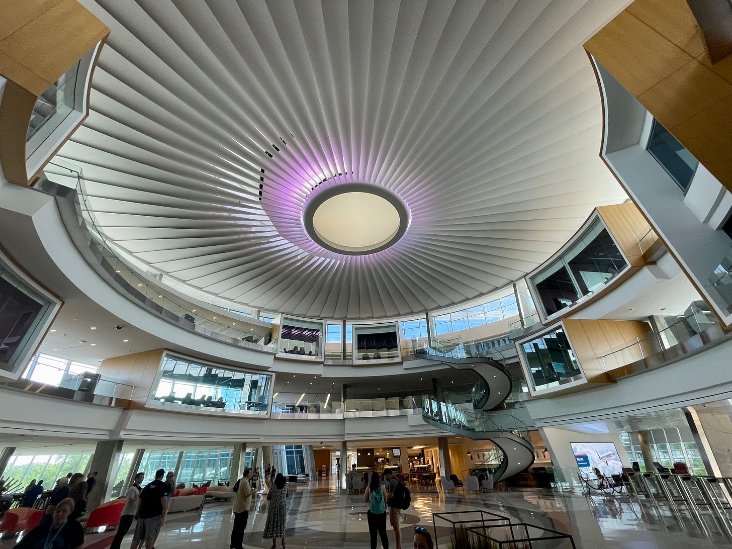 The main lobby in the Skyview 8 building with a jet-turbine-themed ceiling at the new American Airlines headquarters campus near DFW airport